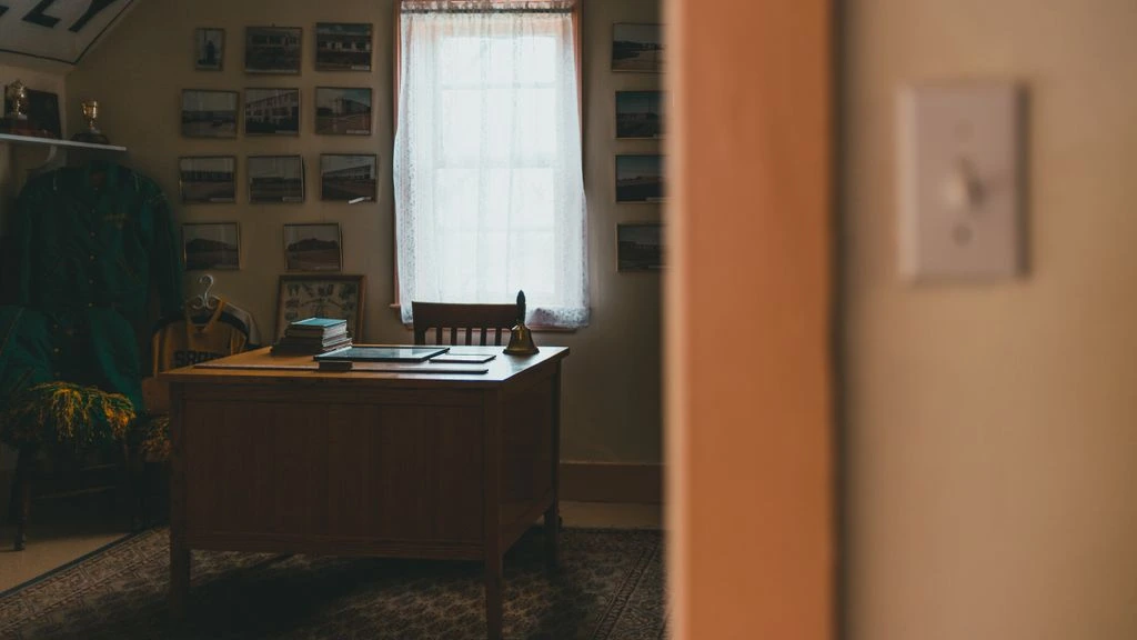 A senior partner's desk with a written brief and leather portfolio