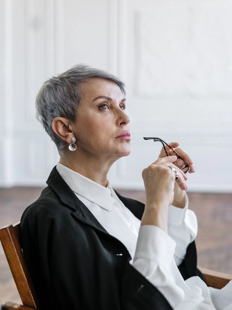 A senior consultant in a New York office, framed for an HBR profile